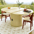 Mesa de comedor con tablero redondeado y base central - amarillo